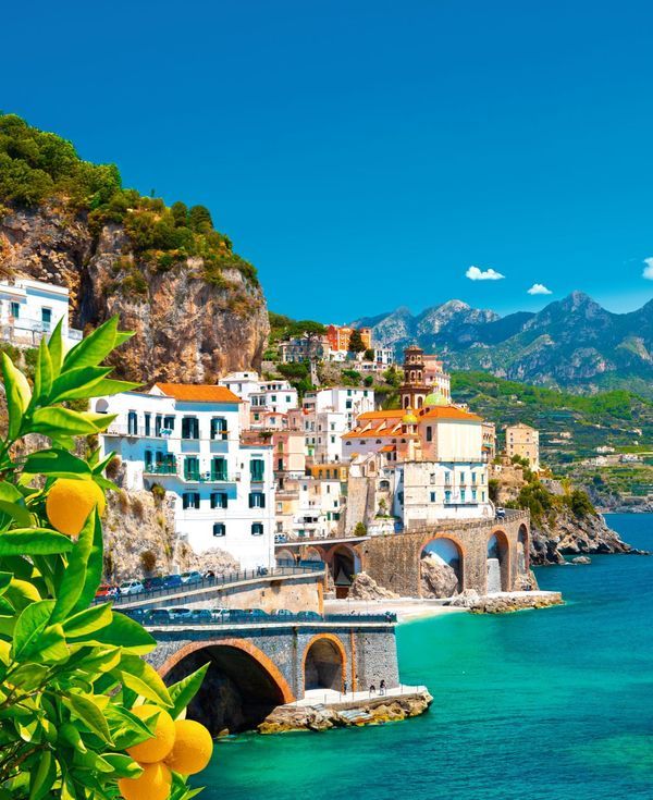1356x1661_Beautiful view of Amalfi on the Mediterranean coast with lemons in the foreground, Italy. High quality photo