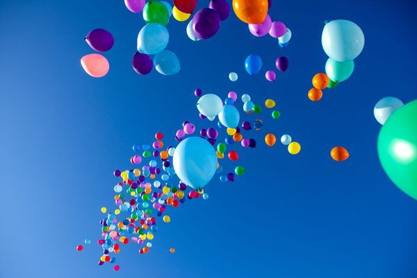 Colorful Balloons flying in the sky party
