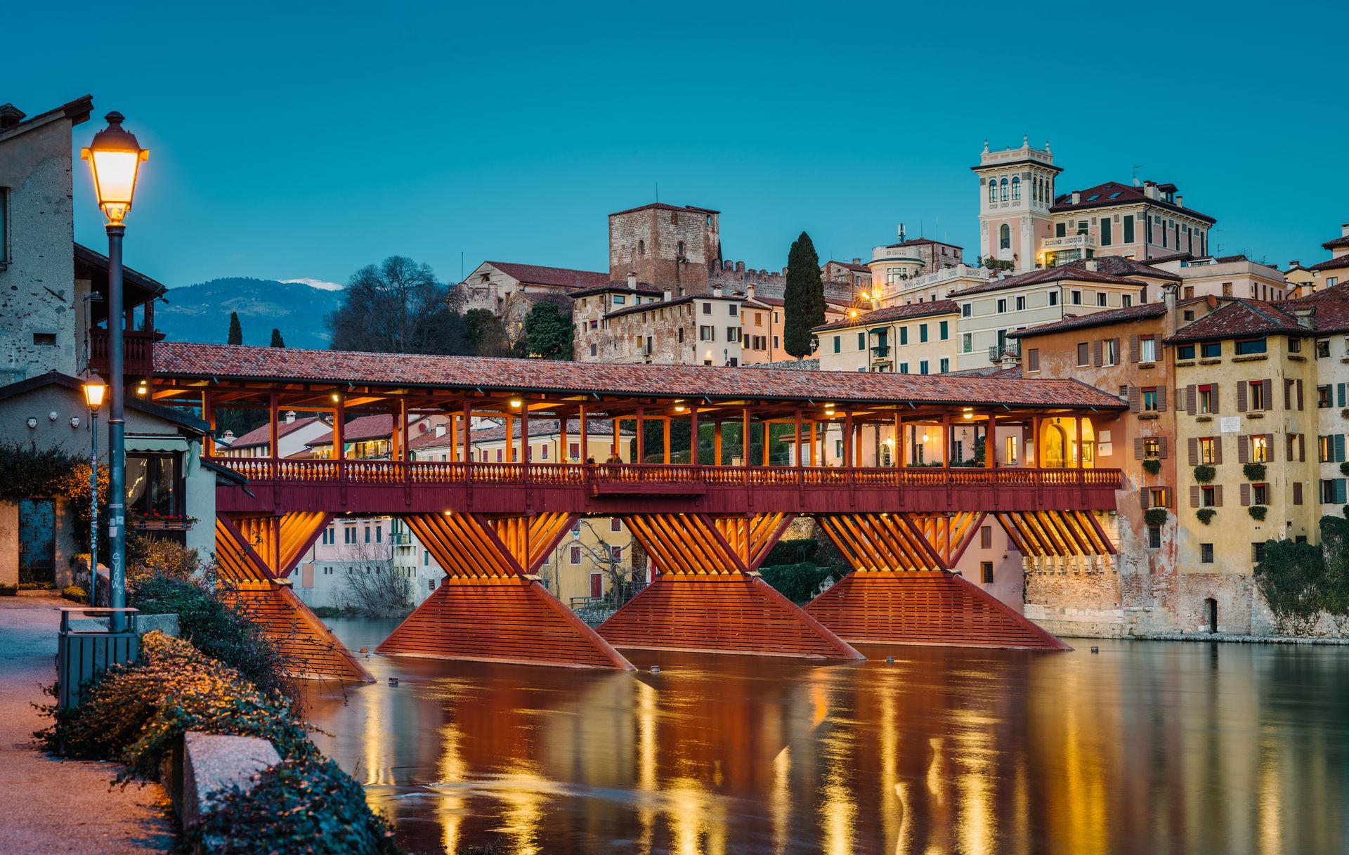 Bassano del Grappa, Italy - January 09, 2024: panorama of the Ponte degli Alpini in the evening