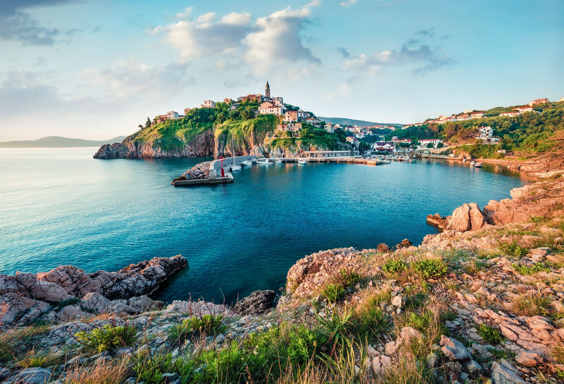 Sunny morning cityscape of Vrbnik town. Romantic summer seascape of Adriatic sea, Krk island, Kvarner bay archipelago, Croatia, Europe. Beautiful world of Mediterranean countries.