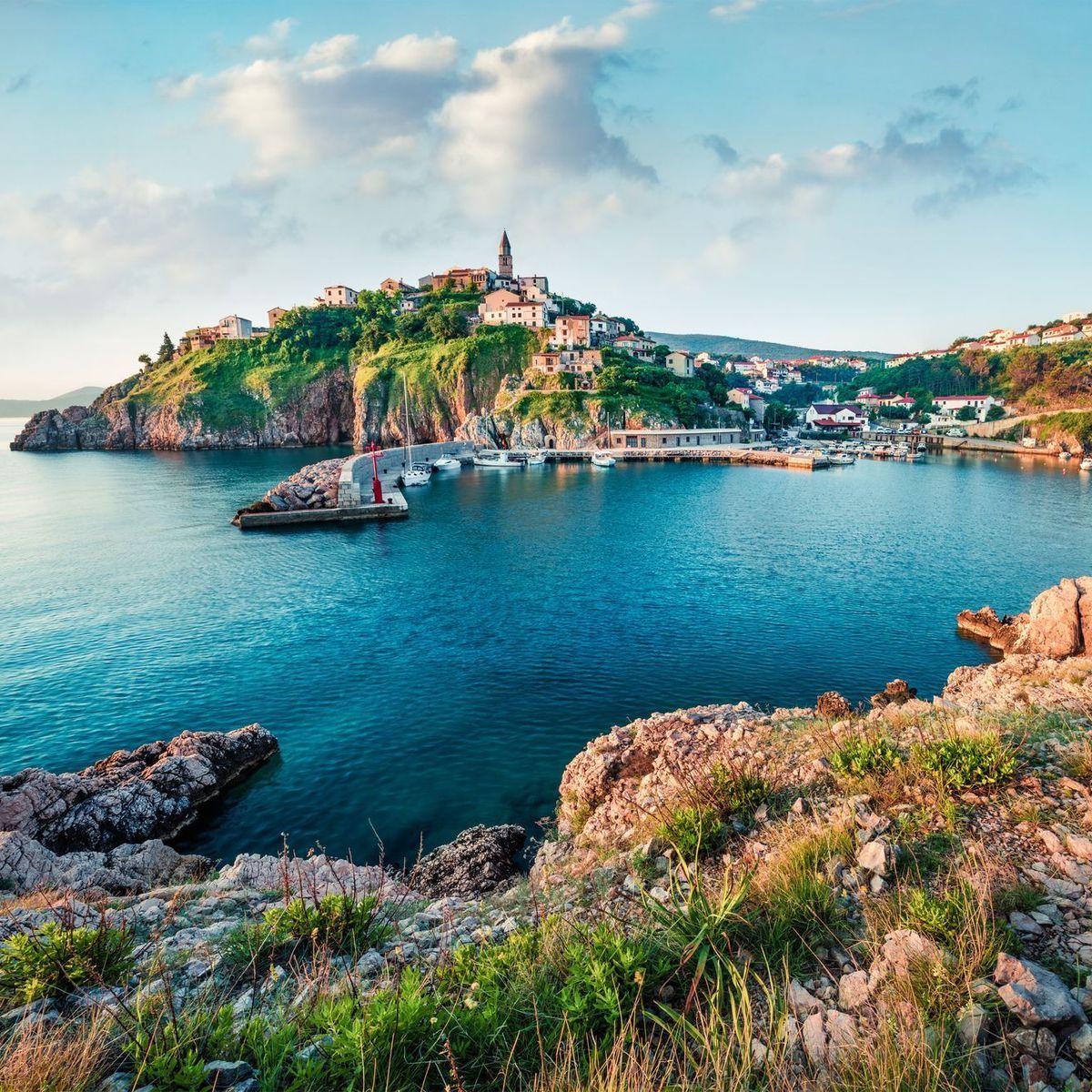 Sunny morning cityscape of Vrbnik town. Romantic summer seascape of Adriatic sea, Krk island, Kvarner bay archipelago, Croatia, Europe. Beautiful world of Mediterranean countries.