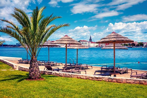 Picturesque spring view of popular summer resort Porec. Colorful spring seascape of Adriatic Sea. Great morning scene of Istrian Peninsula in western Croatia, Europe. Vacation concept background. 