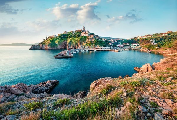Sunny morning cityscape of Vrbnik town. Romantic summer seascape of Adriatic sea, Krk island, Kvarner bay archipelago, Croatia, Europe. Beautiful world of Mediterranean countries.